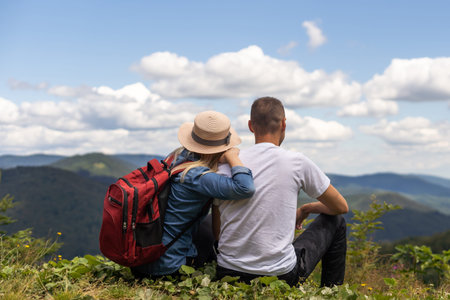Couple travelers Man and Woman sitting relaxing mountains, view Love and Travel happy emotions...