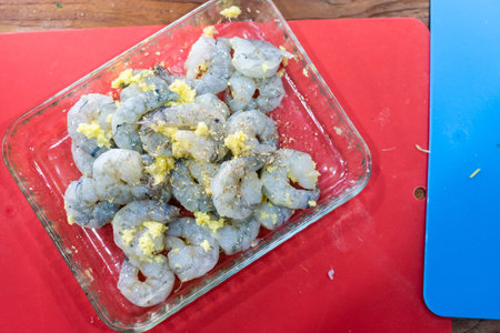 raw peel prawns in a white bowl without a marinate