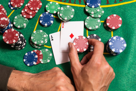 The player makes a bet in poker.
