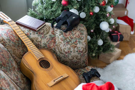 A gift for Christmas, New Year, St. Valentines Day. A game console as a gift.の写真素材