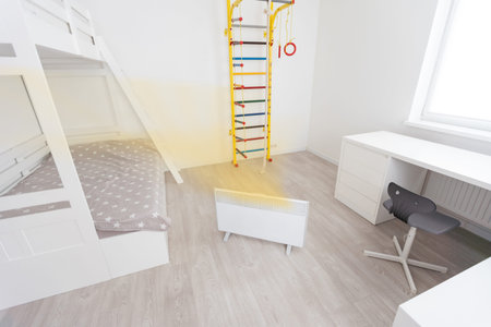 Modern electric heater in stylish room interior.