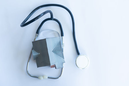 House check. miniature house and stethoscopeの写真素材