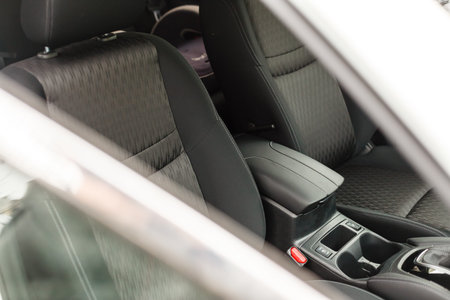 Textile seats in modern car. Interior detail.