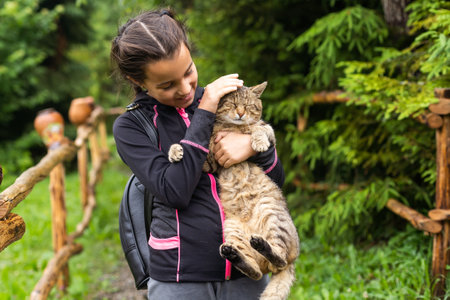 portrait of a little girl with a cat.の写真素材