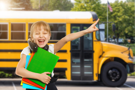 adorable schoolgirl with backpack. Back to school