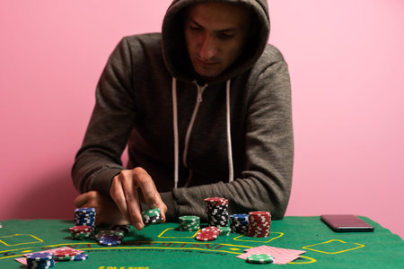 man playing blackjack at the table