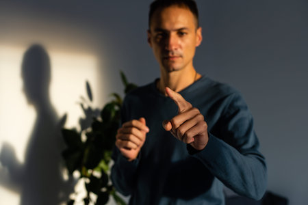 Business man with pointing to something or touching a touch screen on background
