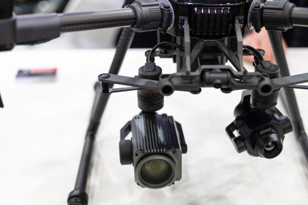 Professional video camera set on a tripod with excellent clipping path