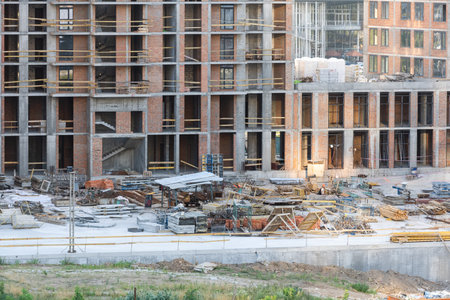 Construction site. Scaffolding. Building frame. Exterior of unfinished building. Modern civil...