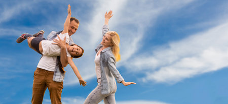 Happy family: mother father and child daughterの写真素材