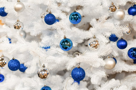 Christmas balls decorate a Christmas tree.の写真素材