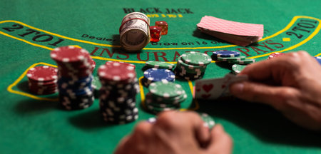 Man playing BlackJack at the casino