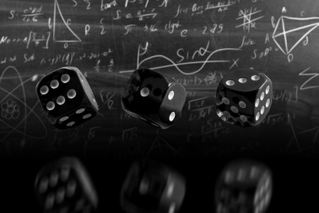 dice on the background of formulas.の写真素材