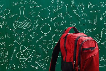 backpack on the background of formulasの写真素材