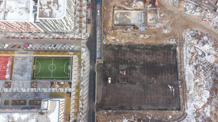 Aerial view from flying drones to parking places. Parking background. Top view