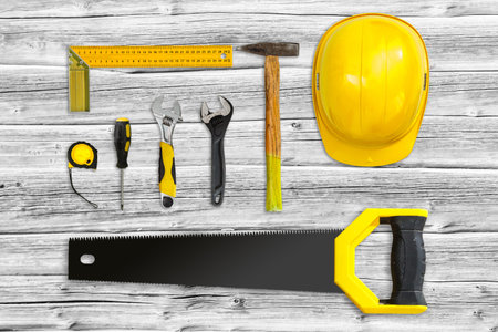 old tools on a wooden background