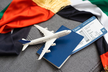 Passport of United Arab Emirates with national flag on the top of an gray backgroundの写真素材