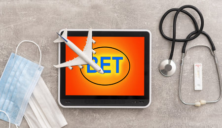 Stethoscope together with a tablet, internet gambling is an addiction and medical help is needed to...