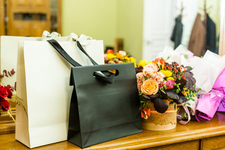 gift packages and bouquets on the table. Festive photo.の写真素材