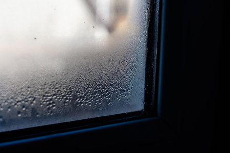 Water droplets condensation background of dew on glass, humidity and foggy blank. Outside , bad weather, rainの写真素材