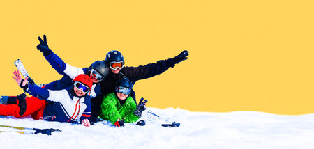 Smiling ski friends skiing alps resortの写真素材