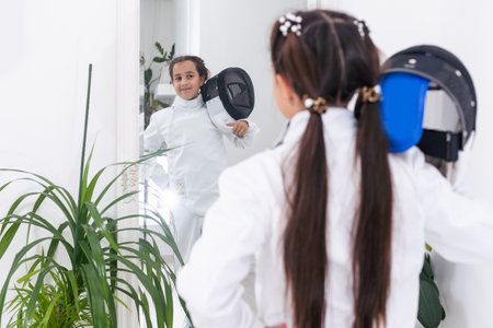 little girl in a fencing suitの写真素材
