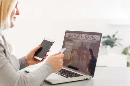 Hands holding credit card and using mobile smart phone with morning, Online shopping.の写真素材