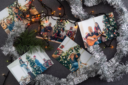 Photos of family against Christmas lights decor backgroundの写真素材