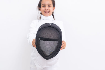Little girl fencer with epee and mask
