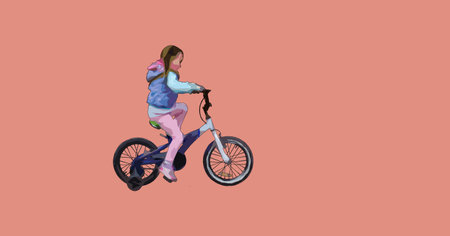 Happy little girl riding a bike design.の写真素材