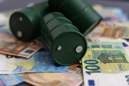 euro banknotes and oil barrel concept photoの写真素材
