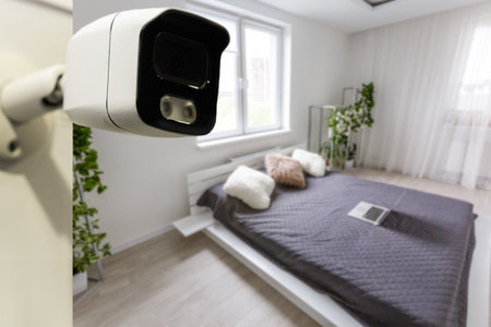 Living room under CCTV cameras surveillance, above viewの写真素材