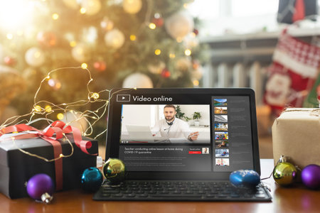 Virtual Christmas tree meeting team teleworking. Family video call remote conference. Laptop webcam screen view. Team meet working from their home offices