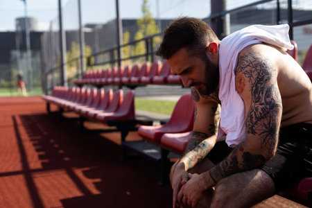 Man resting after training and cooling off.