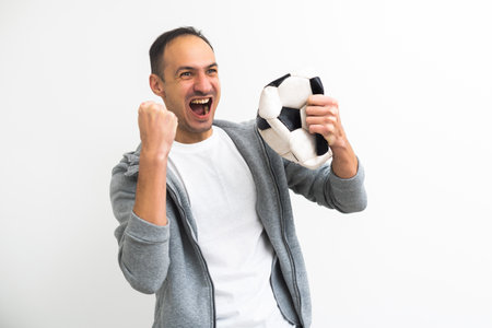 Fan Sport Player celebrating on backgroundの写真素材