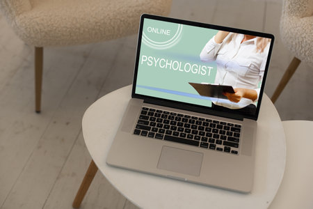 psychologist online on a laptop, speak on webcam on laptopの写真素材