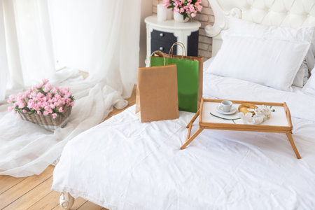 Paper bags on the bed. Online shopping home delivery concept.