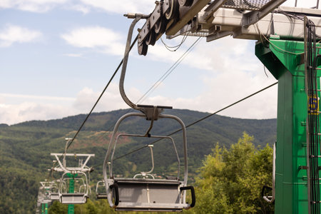 Mountain lift on sky background. Empty space for textの写真素材