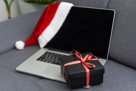 gift box and laptop at home, shopping online, Valentines day, Womens dayの写真素材