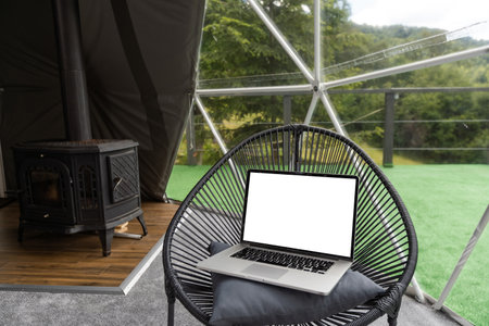 laptop on the chair in the dome tentの写真素材