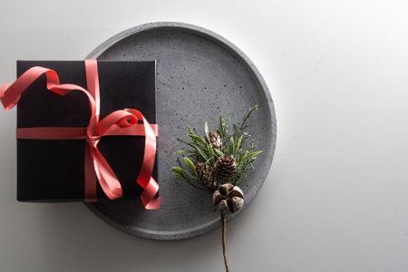 Christmas presents on round tray background
