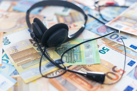 euro banknotes headphones headset, businessの写真素材