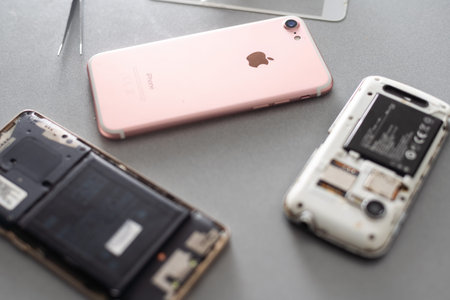 Kiev, Ukraine - December 10, 2022: Close-up image of the central board of the apple iphone. Service...
