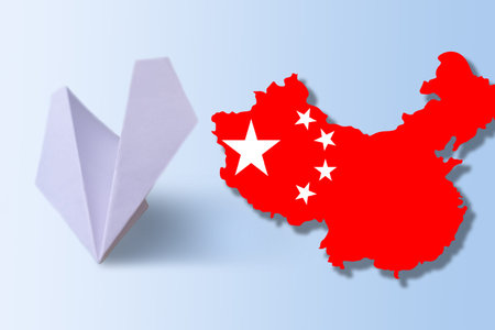 plane figure on china map. Plane taking off from china map.の写真素材