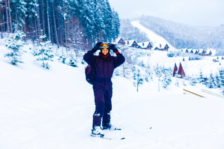 Cross-country skiing: young man cross-country skiing on a lovely sunny winter dayの写真素材