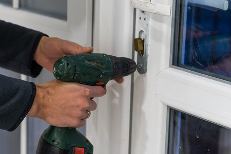 handyman repair the door in the room