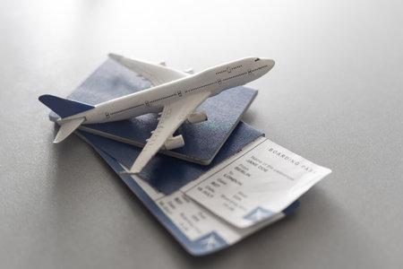 Preparation for Traveling concept, toy airplane, passport with copy spaceの写真素材