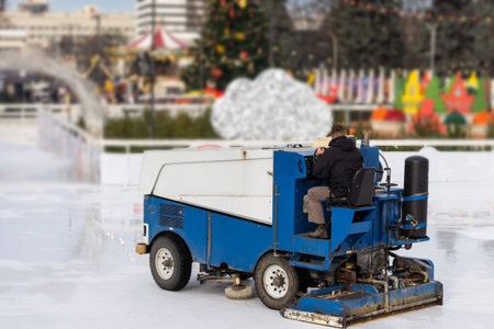 Ice resurfacing machine ,Ice resurfacer, resurfacing the ice rink in the central park of the town.