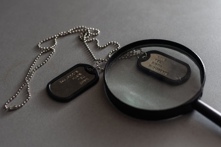 Military ID tags magnifying glass