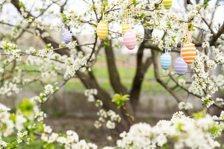 Easter decorative composition with painted eggs, flowering branches.